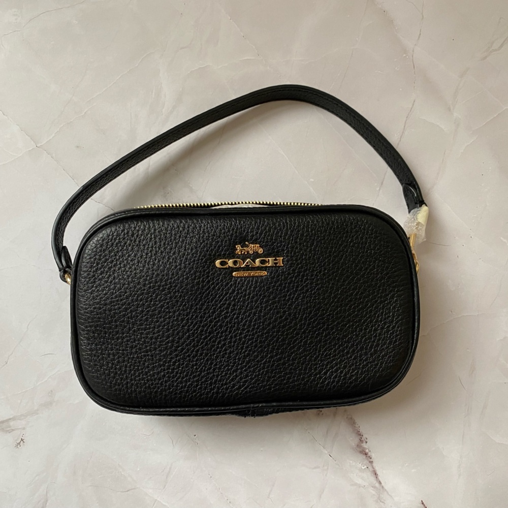 BLACK Coach Wristlet. NEVER WORN or opened.